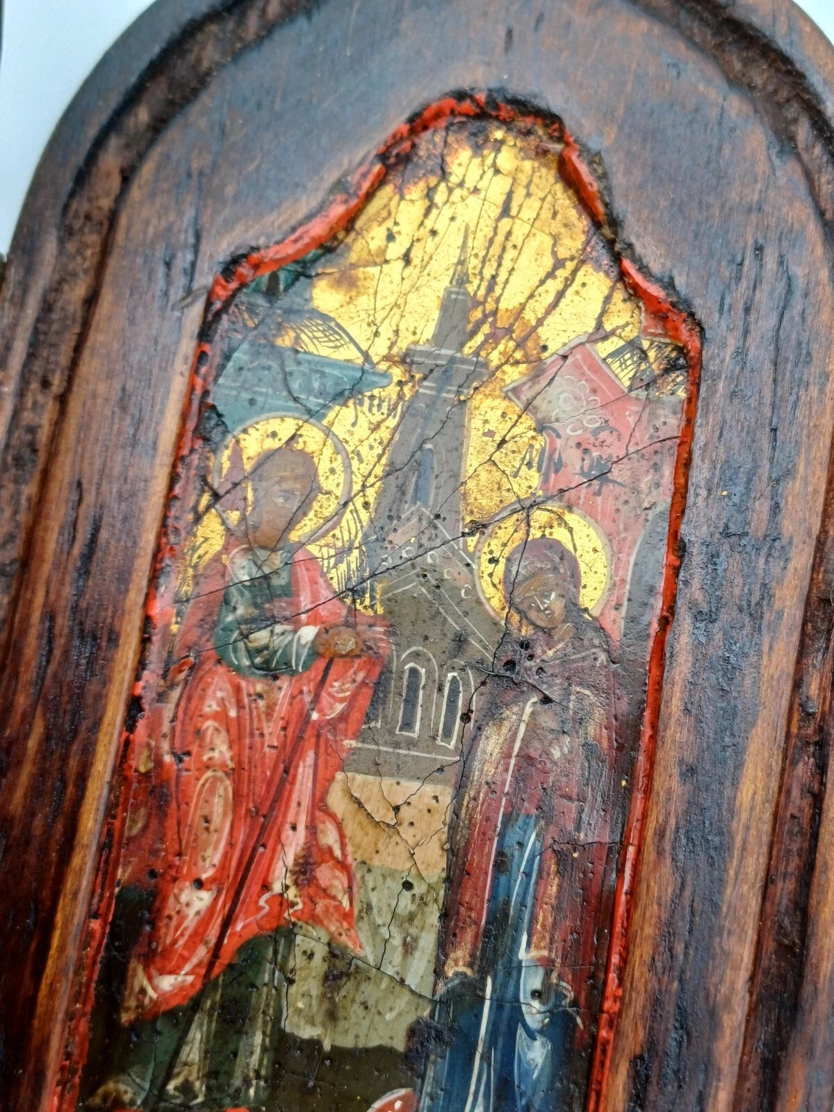 Icona religiosa in legno con dipinti ad olio su tre facciate