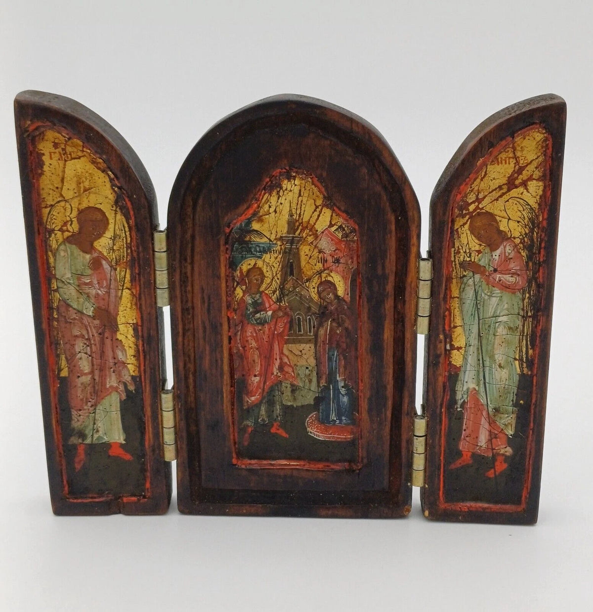 Icona religiosa in legno con dipinti ad olio su tre facciate