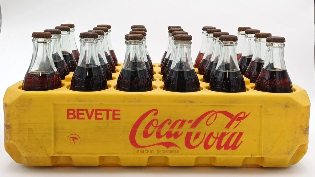 Coca-Cola – Cassetta originale con 24 bottiglie in vetro – 1977