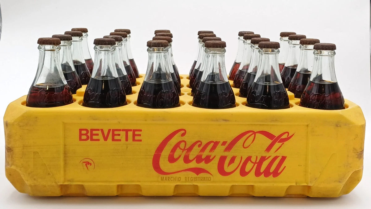 Coca-Cola – Cassetta originale con 24 bottiglie in vetro – 1977