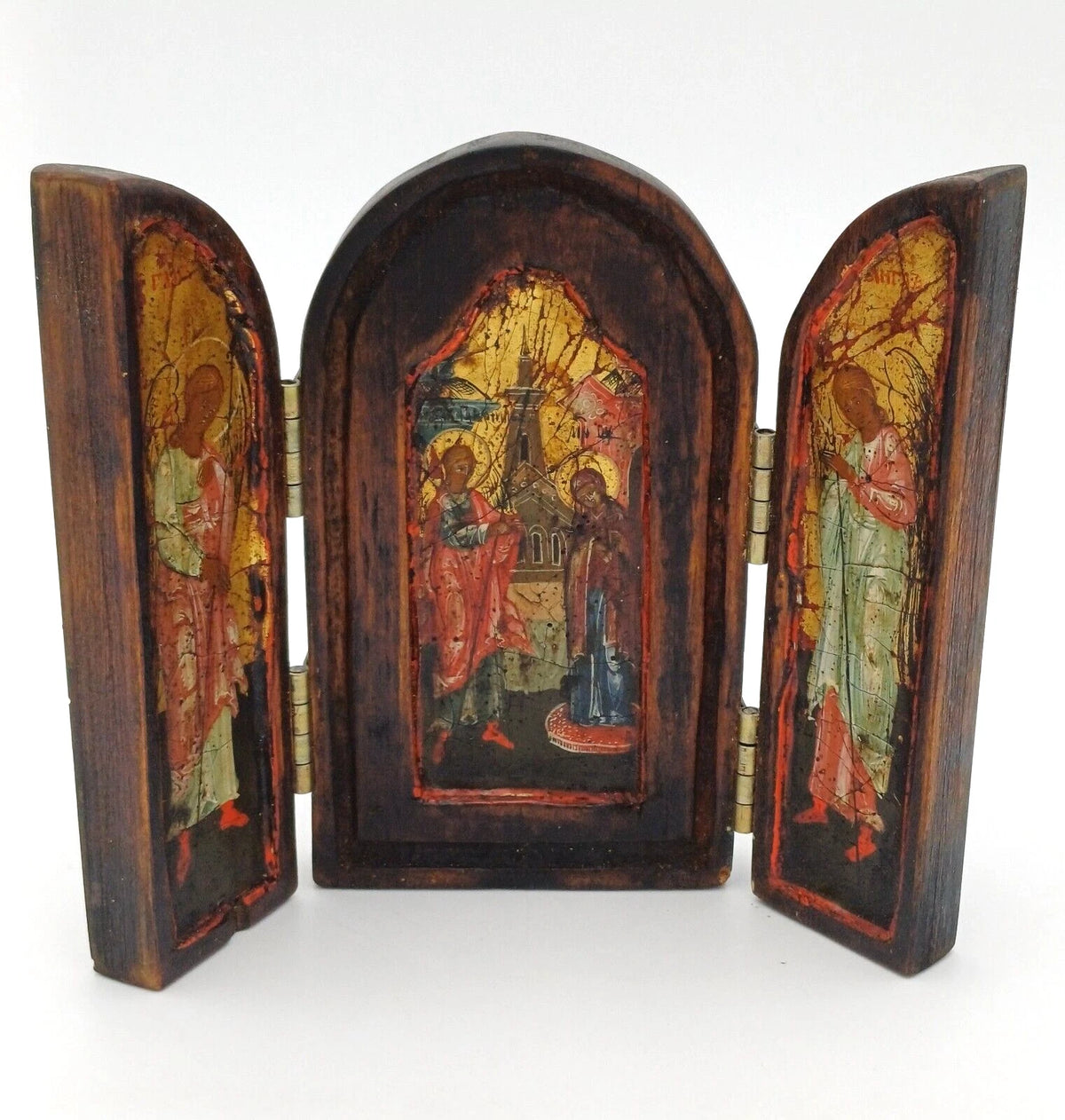 Icona religiosa in legno con dipinti ad olio su tre facciate